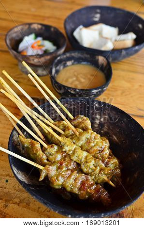 Pork Satay. grilled pork served with peanut sauce or sweet and sour sauce