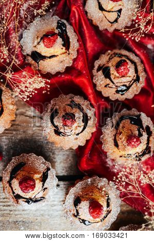Delicious Chocolate Cupcakes With Berries On Wodeen Table, Top V