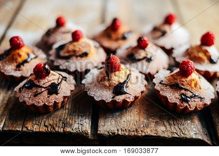 Delicious Chocolate Cupcakes With Berries On Wodeen Table, Top V