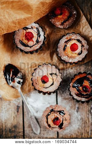 Delicious Chocolate Cupcakes With Berries On Wodeen Table, Top V