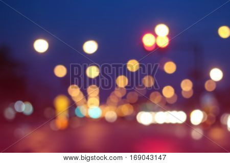 Bokeh traffic light on the road for background