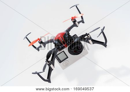 Quadcopter drone with camera isolated on a white background