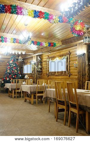 Interior of a cafe in a wooden house