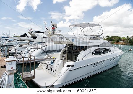 La Romana Dominican republic-February 16 2016: luxury yachts docked in the port in bay at sunny day with clouds on blue sky in La Romana Dominican Republic