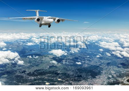 Airplane over the clouds.