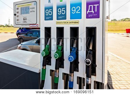 ST.PETERSBURG RUSSIA - JULY 31 2016: Filling the column with different fuels at the gas station Lukoil. Lukoil is one of the russian oil companies