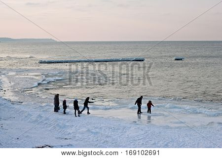View of the sunset of the Baltic Sea in the winter.