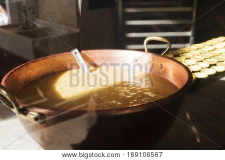 Cream for the Portuguese dessert Pastel de nata. Production of Pastel de nata