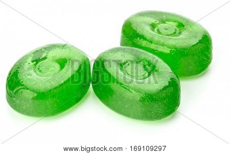 Three colorful fruit hard sugar candies,  boiled sweeties or sugar plums isolated on white background cutout