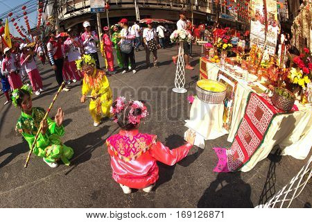 NAKORNSAWAN ,THAILAND - JANUARY 31,2017 : Unidentified young girls provide music for dance on the parade during Chinese New Year celebrations in Nakornsawan Province ,Middle of Thailand.
