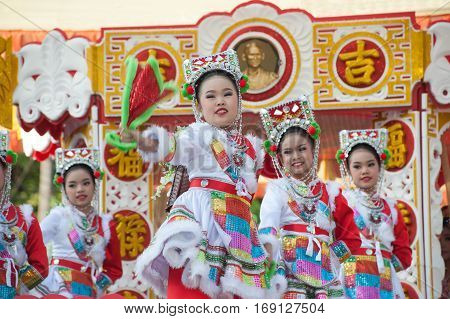 NAKORNSAWAN ,THAILAND - JANUARY 31,2017 : Unidentified young girls provide music for dance on the parade during Chinese New Year celebrations in Nakornsawan Province ,Middle of Thailand.