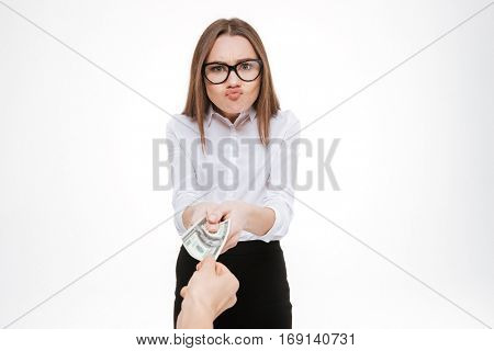 Greedy funny businesswoman taking bribe isolated on white