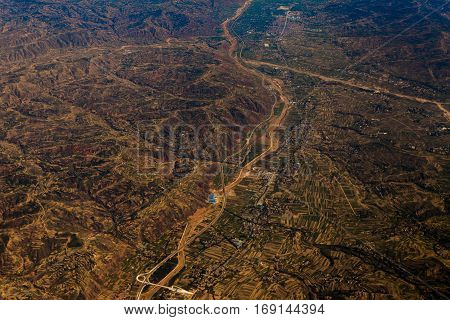 aerial agriculture landscape with river and farms in China