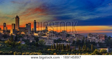 Amazing sunset panoramic view of towers of old town San Giminiano, Tuscany, Italy