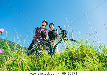 Cycling senior couple enjoying summer at the vilsalpsee in austria