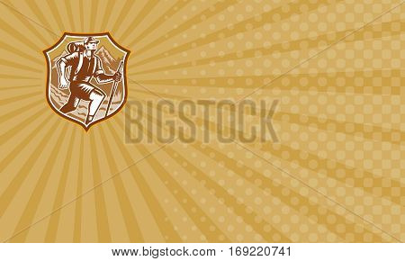 Business card showing Illustration of a male hiker hiking walking holding staff with river and mountains in background set inside shield crest done in retro woodcut style.