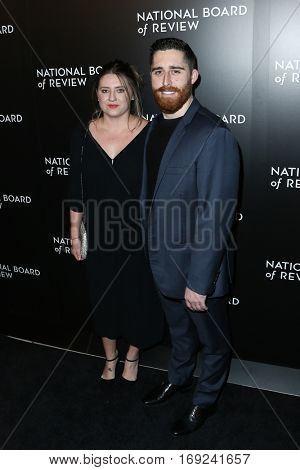 NEW YORK-JAN 4: Director Trey Edward Shults (R) and guest attend the National Board of Review Gala at Cipriani Wall Street in New York on January 4, 2017.