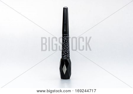 Eyeliner bottle beauty makeup cosmetic on studio