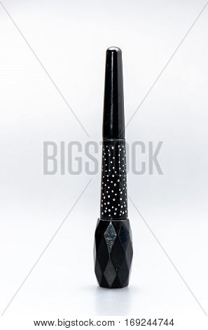 Eyeliner bottle beauty makeup cosmetic on studio