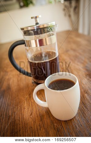 White Cups And Coffee Plunger