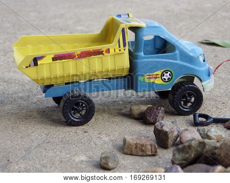 truck toy is going to haul the rocks