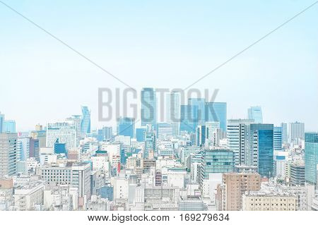 Asia Business concept - panoramic modern cityscape building bird eye aerial view under sunrise and morning blue bright sky from Nagoya TV Tower in Nagoya Japan mix hand drawn sketch illustration