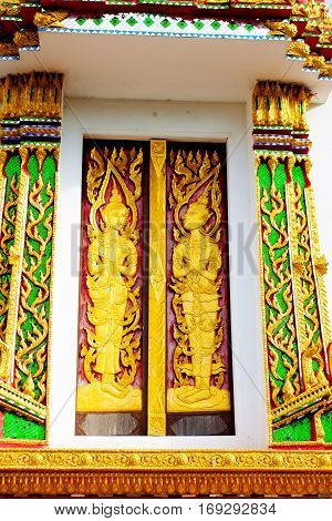 Beautiful Wat Thai golden temple architecture detail Photharam Ratchaburi Thailand