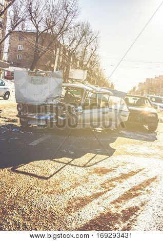 Car crash accident on street of Voronezh, damaged automobiles after collision in city. Image with copy space