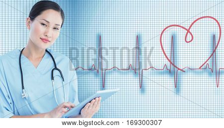 Surgeon using digital tablet with group around table in hospital against medical background with red ecg line