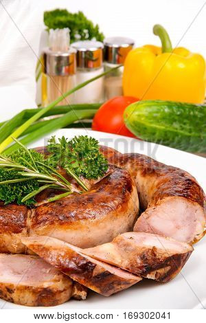 Home sausage of pork with herbs and spices