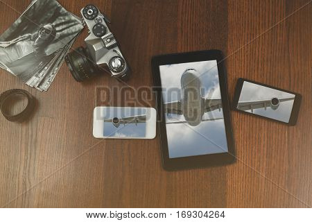 close-up, camera, photography, phones and tablet on desk. Travel background