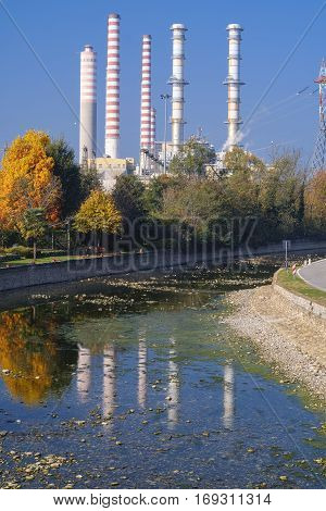 Turbigo (Milan Lombardy Italy): industrial chimneys along the Naviglio Grande