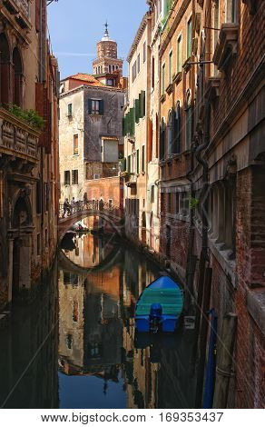 Scenic View Of Venetian Canal With Boat, Venice, Italy