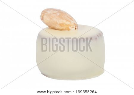 Gourmet bonbon, aka bon-bon or truffle made of white chocolate. Closeup macro detail isolated on white background