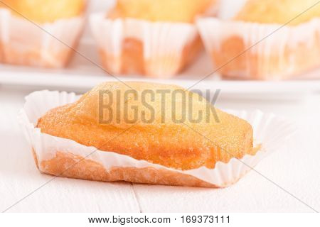 Breakfast with mini  plumcake  on white dish.