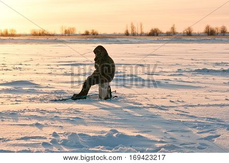 Fisherman enjoying a days fishing on the ice
