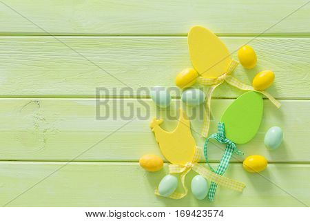 Easter background with flaffy willow and decorations, copy space