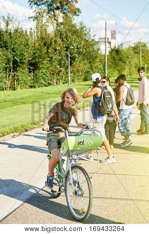 Young Boy Riding A Bicycle In France