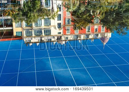 Building reflection in Promenade du Paillon, Nice, France