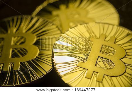 Macro View Of Shiny Coins With Bitcoin Symbol On Dark Background