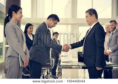 Business Partners Introductionary Handshake Bow