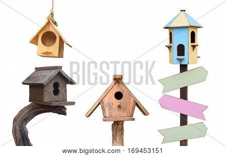 Different types of wooden bird houses isolated on white background