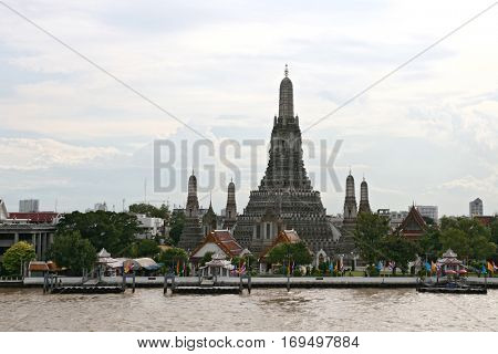 landscape of Wat Arun or Temple of dawn located at Chaophraya river in Bangkok Thailand, vertical