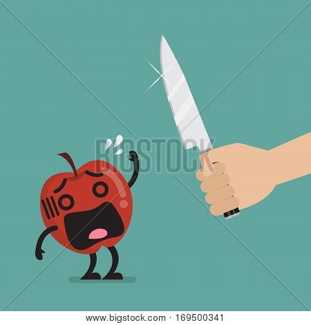 Hand with a knife prepare to cut the scared apple