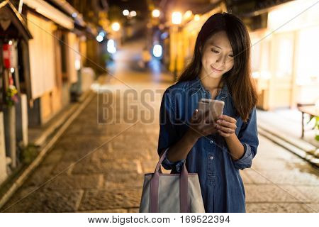 Woman using smart phone