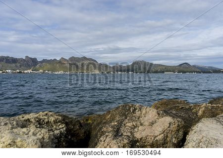 Rocks by the Mediterranean sea on the island of Ibiza in Spain, holiday and summer scene