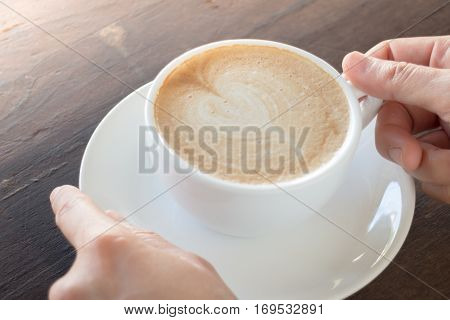 Hot cup of coffee latte stock photo