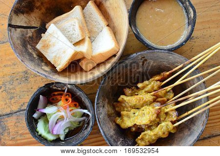 Pork Satay. grilled pork served with peanut sauce or sweet and sour sauce