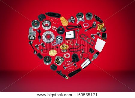 Heart spare auto parts for car on red background. Set with many isolated items for shop or aftermarket, OEM