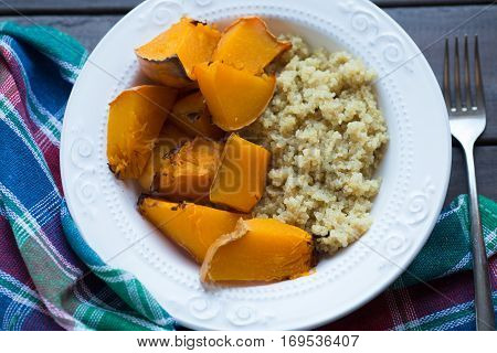 a dish of cooked pumpkin and quinoa. Top view